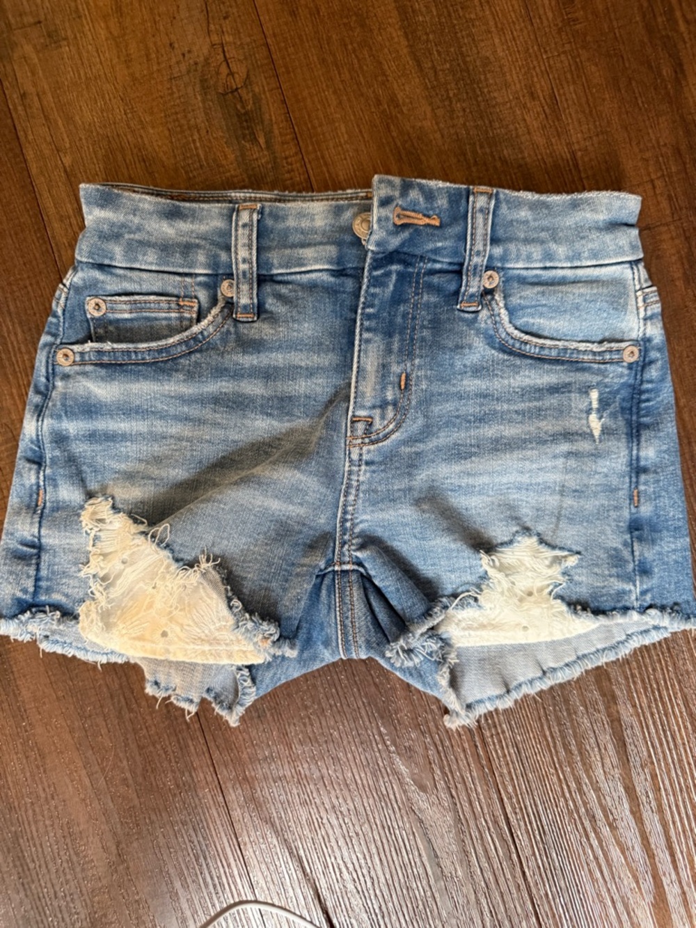 American Eagle Outfitters Light Blue Distressed Denim Shorts, size 000